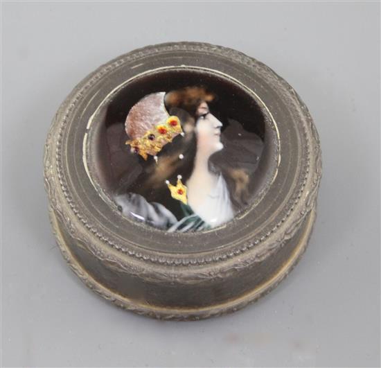 A late 19th/early 20th century French silver and Limoges enamel circular snuff box and cover, 57mm.